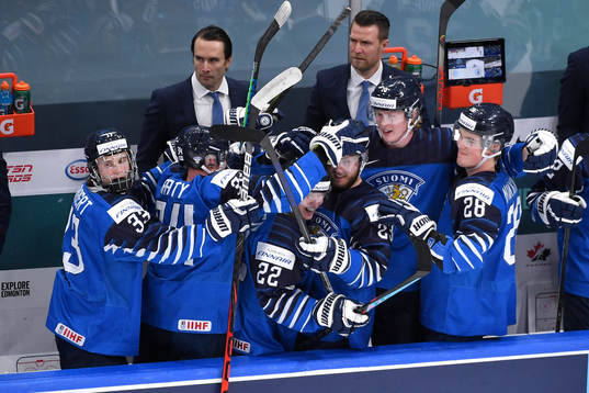 Team Finland players celebrate