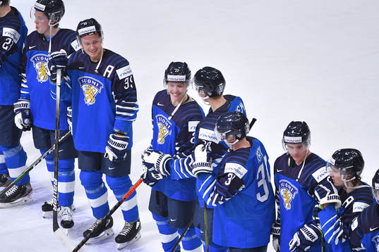 Team Finland players celebrate their win