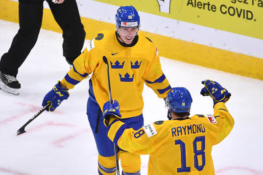 Elmer Söderblom and Lucas Raymond of Sweden celebrate the