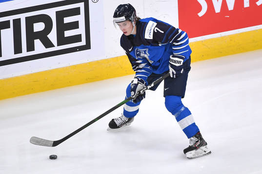 Topi Niemela of Finland skates with the puck