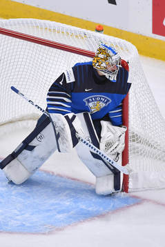 Kari Piiroinen of Finland guards the post