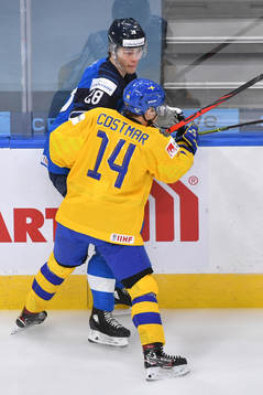 Arvid Costmar of Sweden takes Henri Nikkanen of Finland