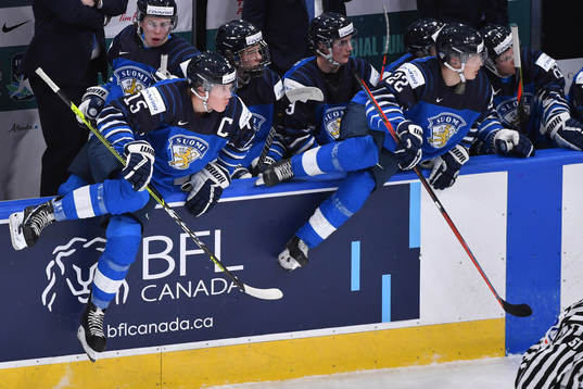 Roni Hirvonen and Anton Lundell of Finland jump over the