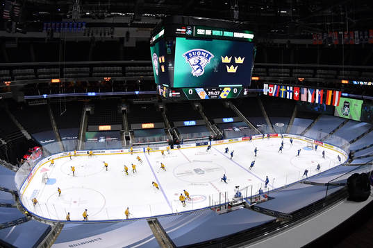 Team Sweden and Team Finland take warm up