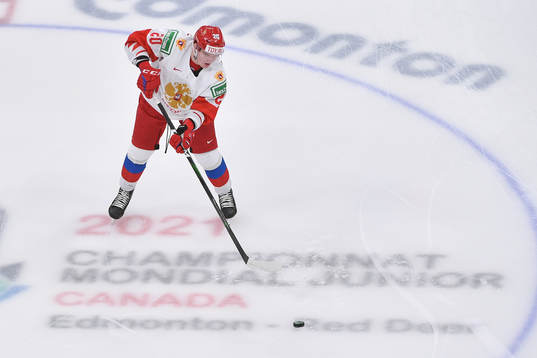 Kirill Kirsanov of Russia passes the puck