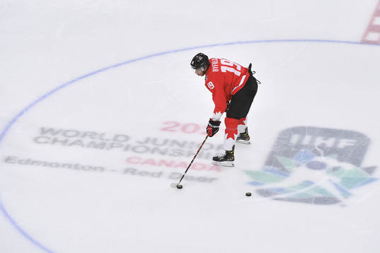 Quinton Byfield of Canada handles the puck
