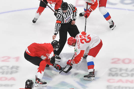Marat Khusnutdinov of Russia and Connor McMichael of Canada