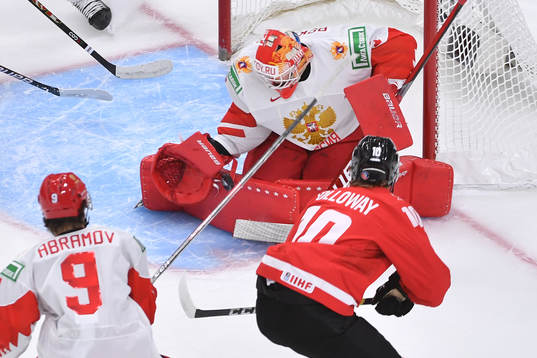 Yaroslav Askarov of Russia makes a save