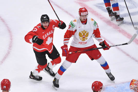 Dylan Cozens of Canada celebrates Cole Perfetti's 3-0 goal