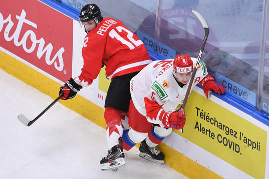Semyon Chistyakov of Russia collides with Jakob Pelletier