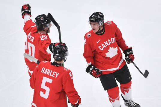 Braden Schneider of Canada celebrates the 4-0 goal with