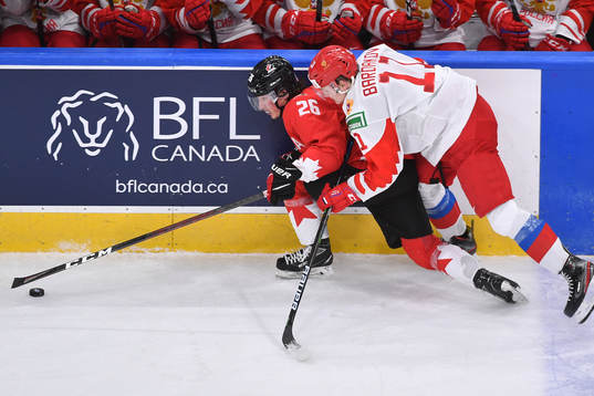 Zakhar Bardakov of Russia pressures Philip Tomasino of