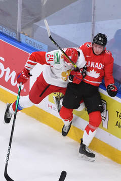Ilya Safonov of Russia collides with Thomas Harley of Canada