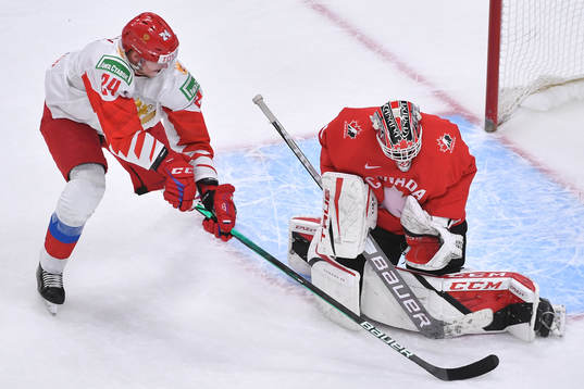 Devon Levi of Canada makes save