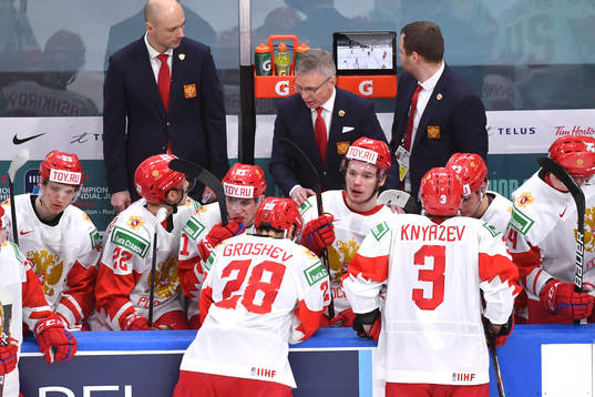 Team Russia Head Coach Igor Larionov talks to his players