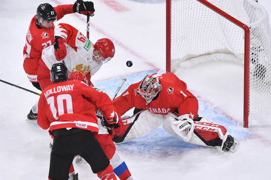 Devon Levi of Canada makes save