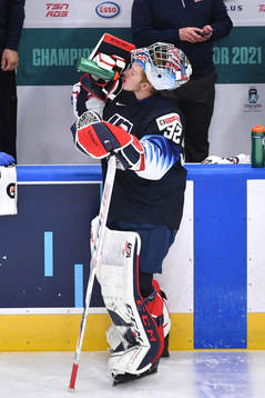 Dustin Wolf of USA takes a water break