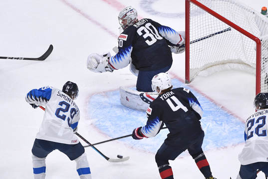 Kasper Simontaival of Finland scores