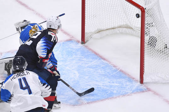 Matthew Boldy of USA scores a power play goal to make the