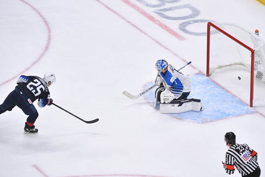 John Farinacci of USA scores a breakaway goal to make the