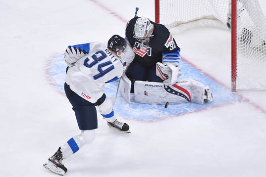 Spencer Knight of USA makes a save