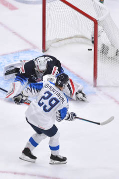 Kasper Simontaival of Finland scores