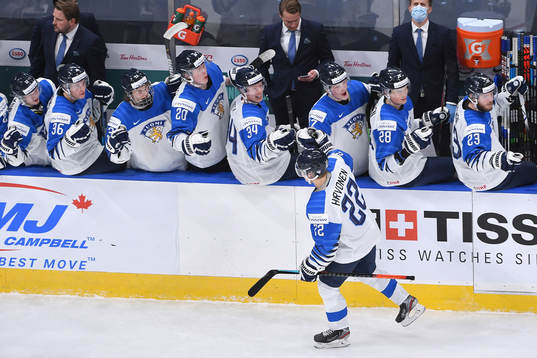 Roni Hirvonen of Finland celebrates the 3-3 gaol