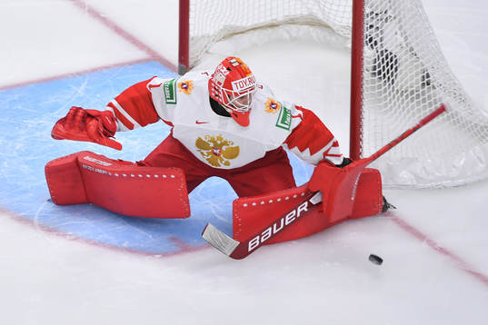 Yaroslav Askarov of Russia makes a save