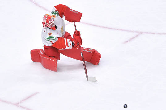 Yaroslav Askarov of Russia clears the puck