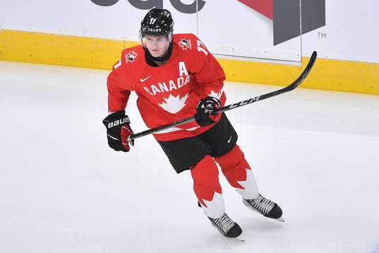 Connor McMichael of Canada participates in warm up