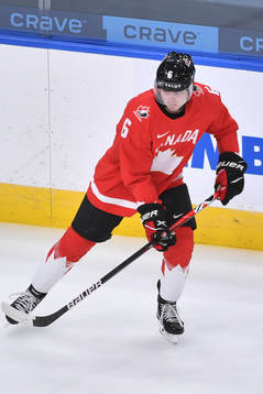 Jamie Drysdale of Canada participates in warm up