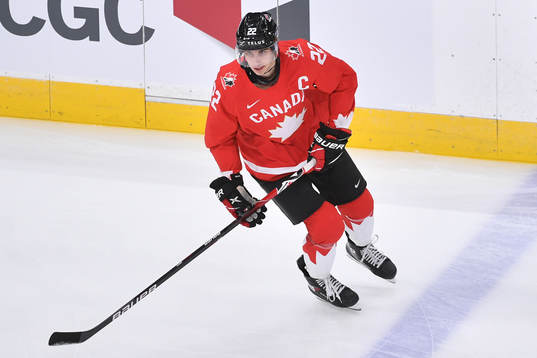 Dylan Cozens of Canada participates in warm up