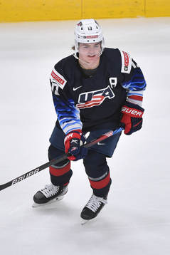 Cole Caufield of USA participates in warm up