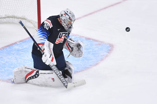 Spencer Knight of USA makes a save