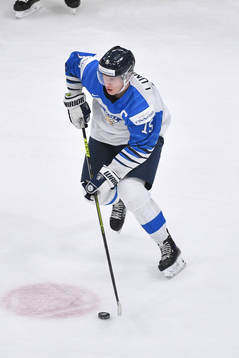 Anton Lundell of Finland skates with the puck