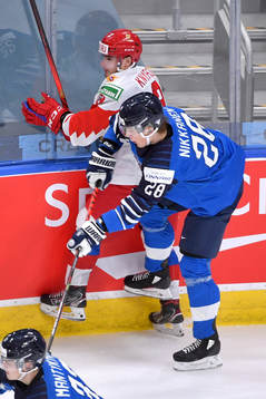 Henri Nikkanen of Finland collides with Artemi Knyazev of