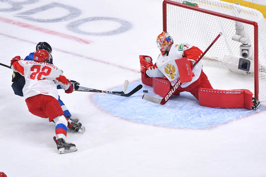 Yaroslav Askarov of Russia makes a save