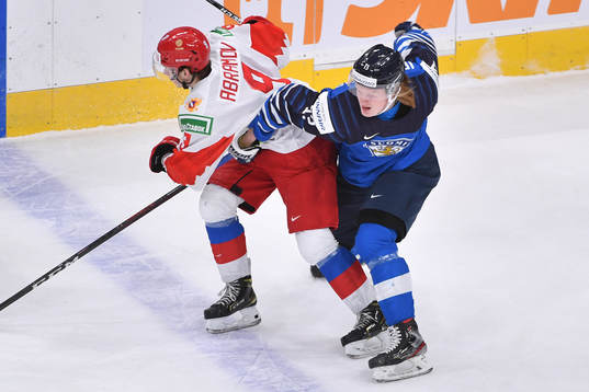 Roby Jarventie of Finland slows down Mikhail Abramov of