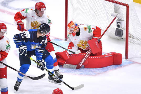 Yaroslav Askarov of Russia makes a save