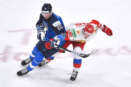 Samuel Helenius of Finland collides with Yegor Afanasiev of