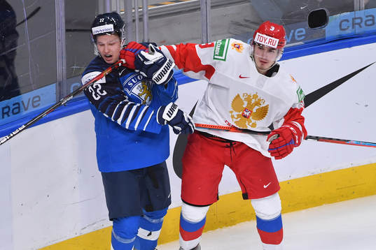 Artemi Knyazev of Russia punches Roni Hirvonen of Finland