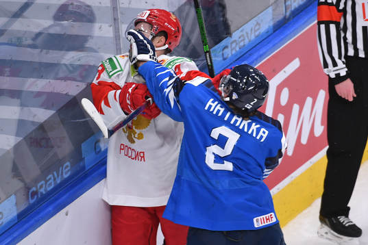 Santeri Hatakka of Finland punches Artemi Knyazev of Russia