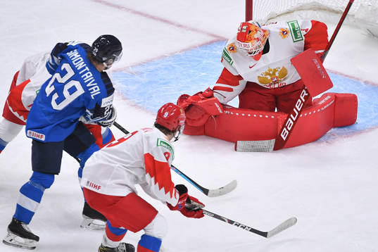 Yaroslav Askarov of Russia makes a save