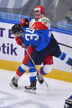 Artemi Knyazev of Russia and Aku Raty of Finland collide