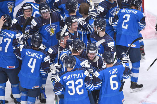 Team Finland celebrates their victory