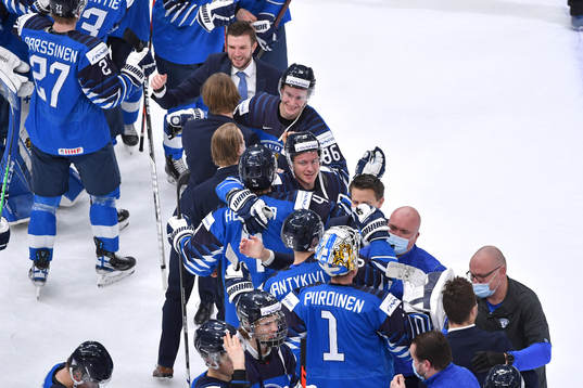 Team Finland celebrates their victory