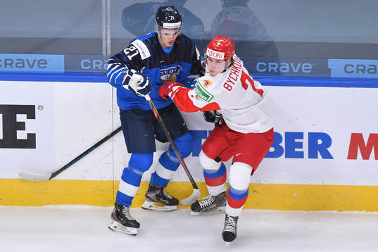 Roman Bychkov of Russia collides with Mikael Pyyhtia of