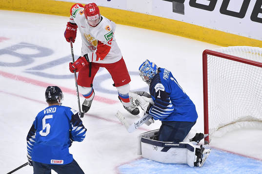 Kari Piiroinen of Finland makes a save as Ilya Safonov of