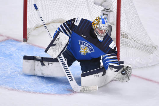 Kari Piiroinen of Finland makes a glove save