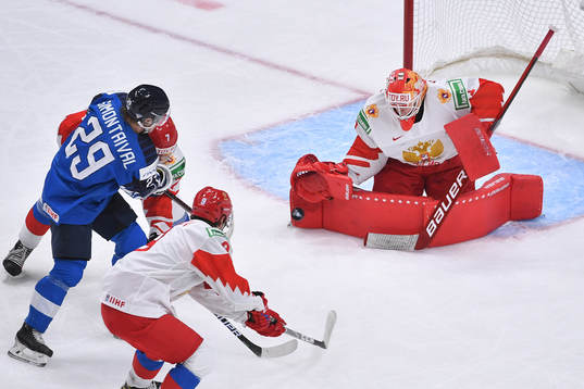 Yaroslav Askarov of Russia makes a pad save